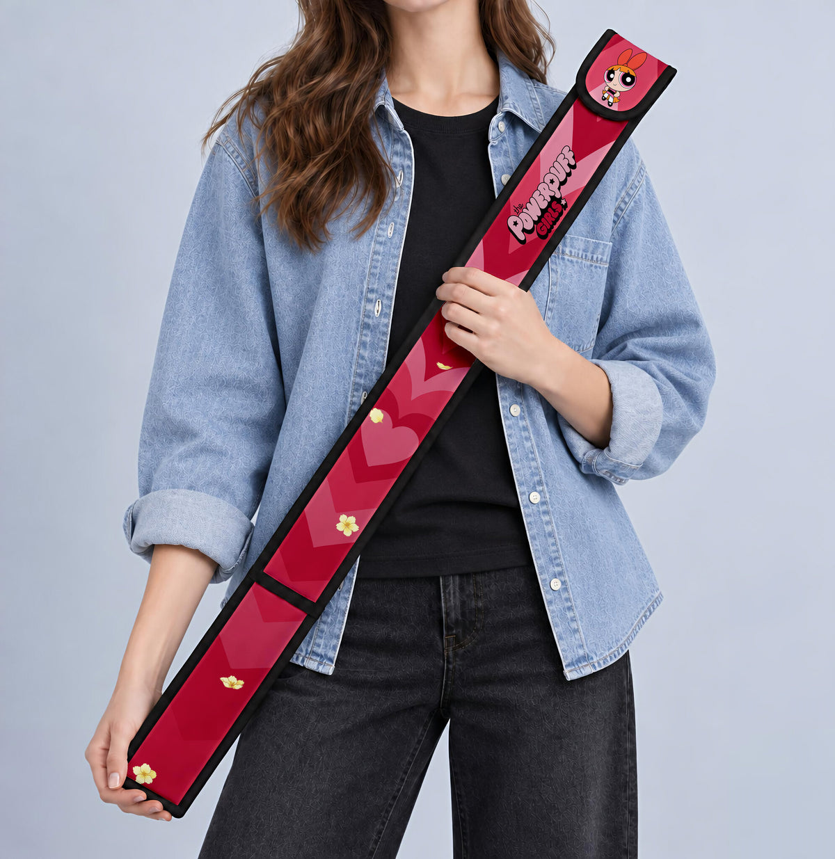 Blossom T-Ruler Cover held against a denim jacket